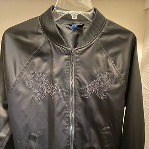 Black divided stitched black on black zip up.